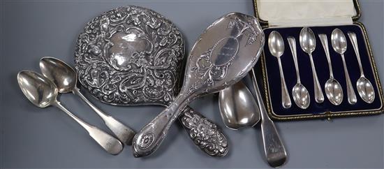 A silver backed mirror and brush, six cased coffee spoons, two Georgian Scottish silver spoons and a damaged silver spoon.